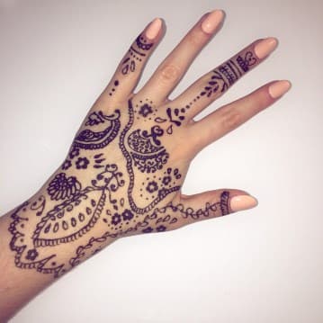 Henna tattoo hand