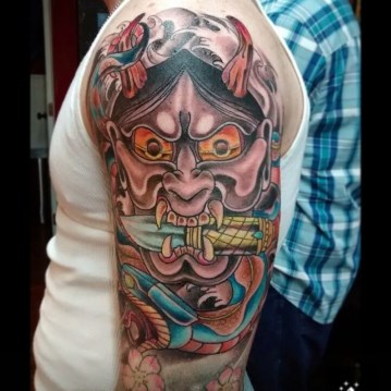 Japanese Oni mask tattoo hand
